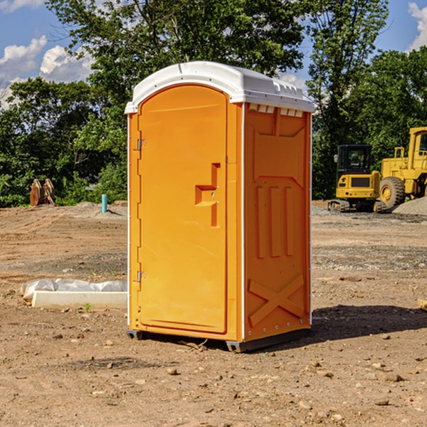 how often are the portable restrooms cleaned and serviced during a rental period in Elmer